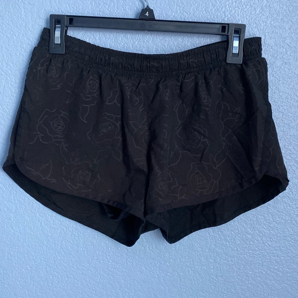 Black old navy athletic shorts with rose pattern